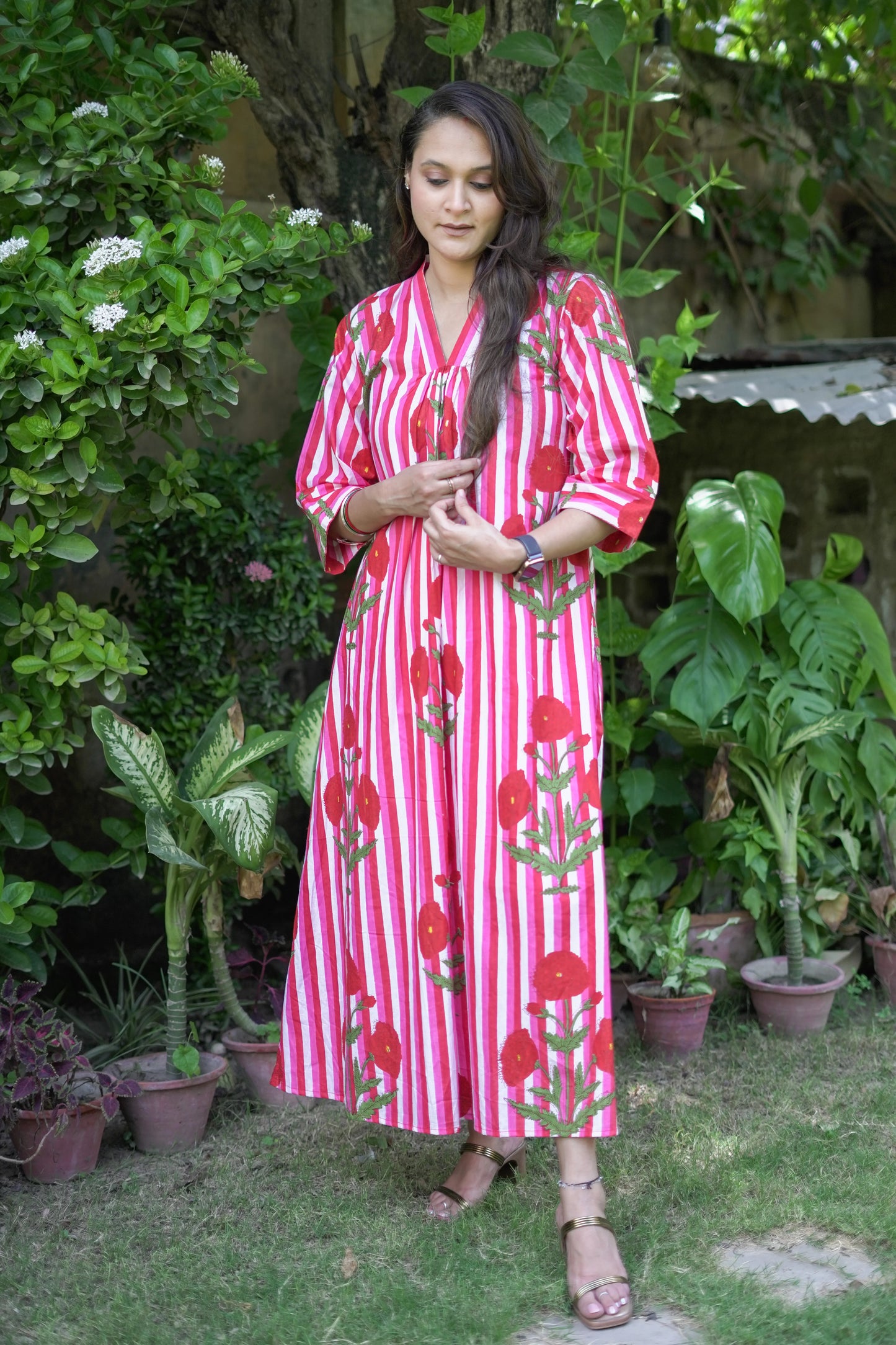 Bold Pink Dress with Stripes and Motifs